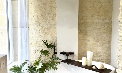 Salle de bain optimisée : intégrer douche, baignoire et WC dans 9 m²
