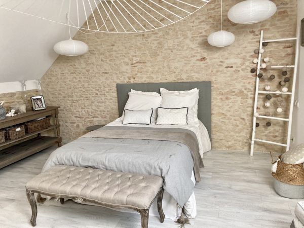 Chambre sous combles : transformer un grenier en espace de vie confortable