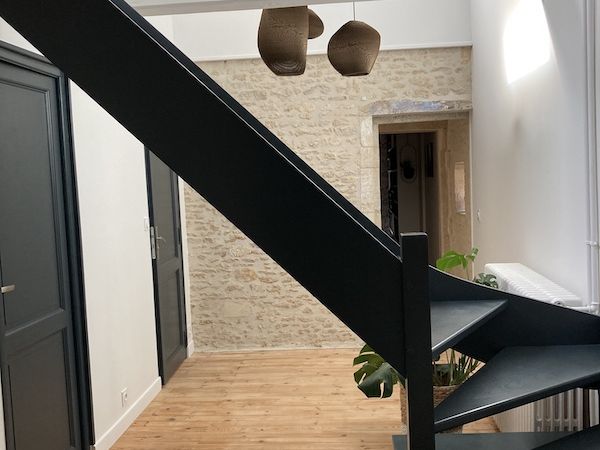 Palier rénové : optimiser l&rsquo;espace et révéler le charme de l&rsquo;ancien